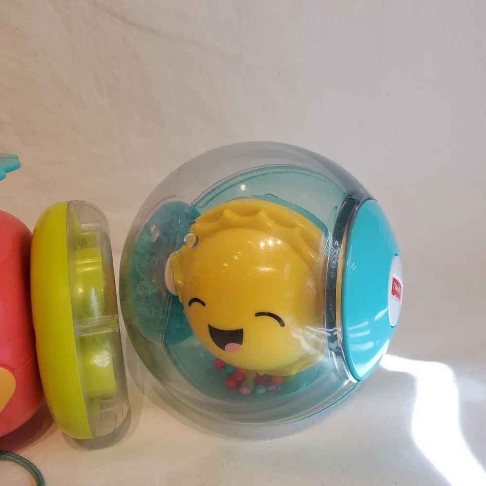 Fisher Price Paradise Pals Flamingo Roll A Round Rainbow Smile Face Pull Toys